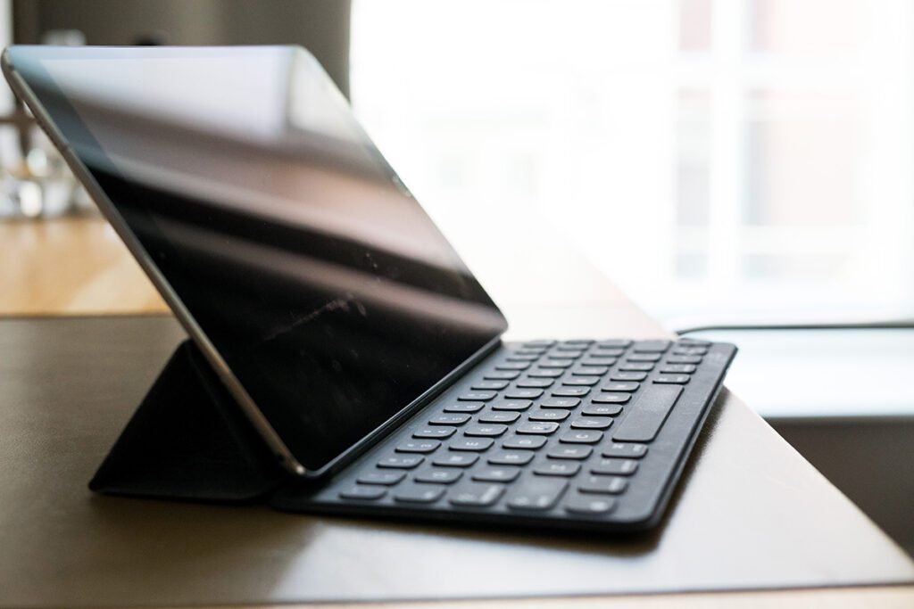 tablet small computer with keyboard on work office PTZ5B7C